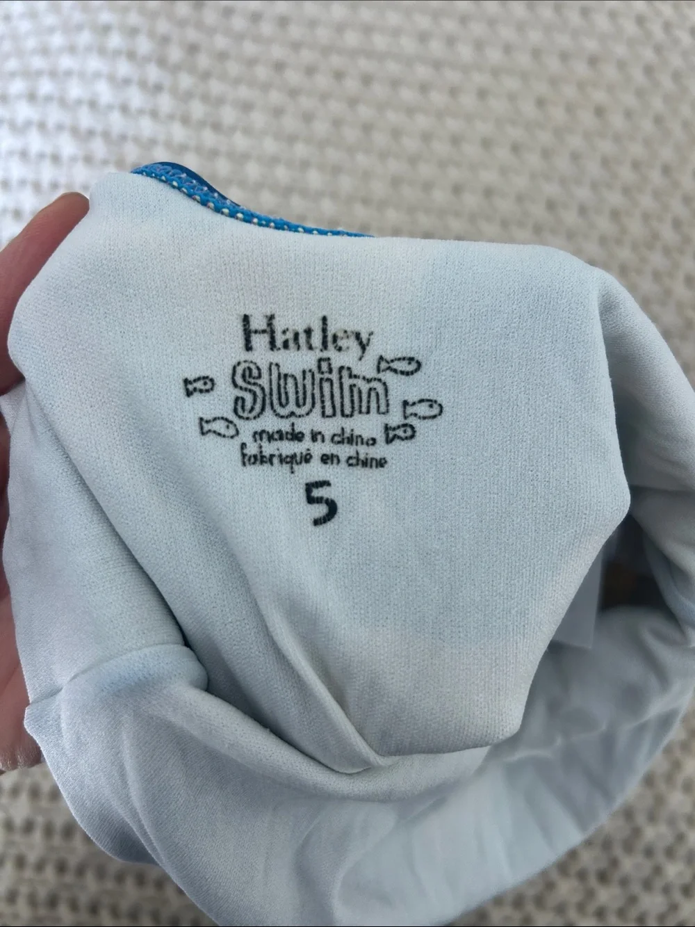 Hatley Navy One-Piece Swimsuit with Rainbow Zebra Print and Pink Tie Accents